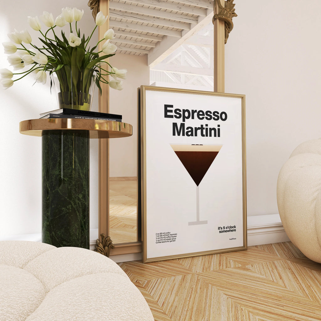 Framed poster of an Espresso Martini with a decorative table and mirror in the background.