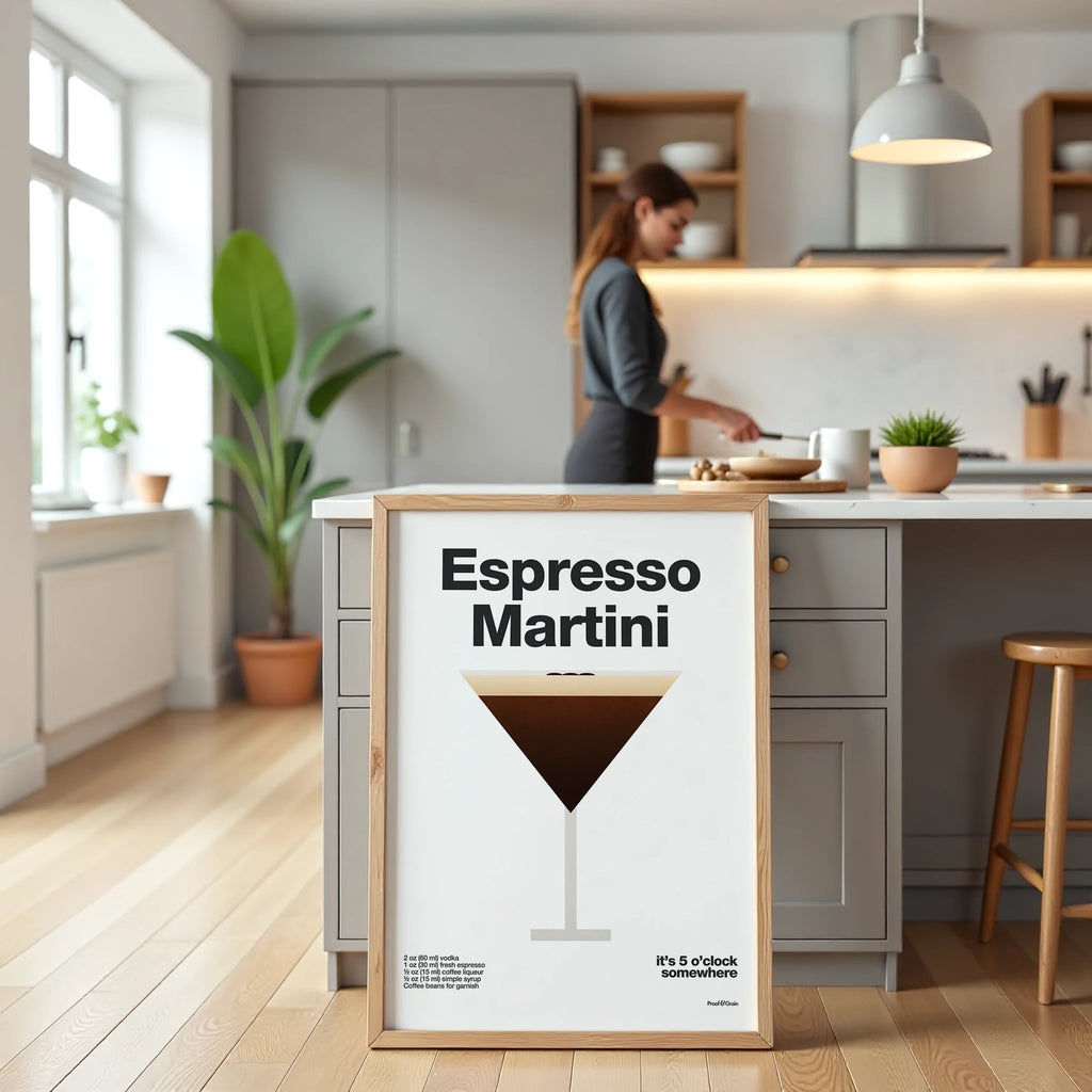 Kitchen interior with a framed Espresso Martini poster on a kitchen island.