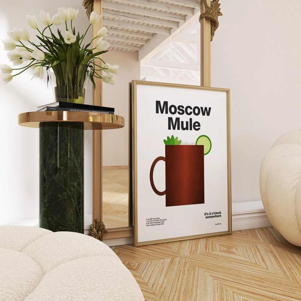 Framed 'Moscow Mule' poster on a wall with decorative elements.
